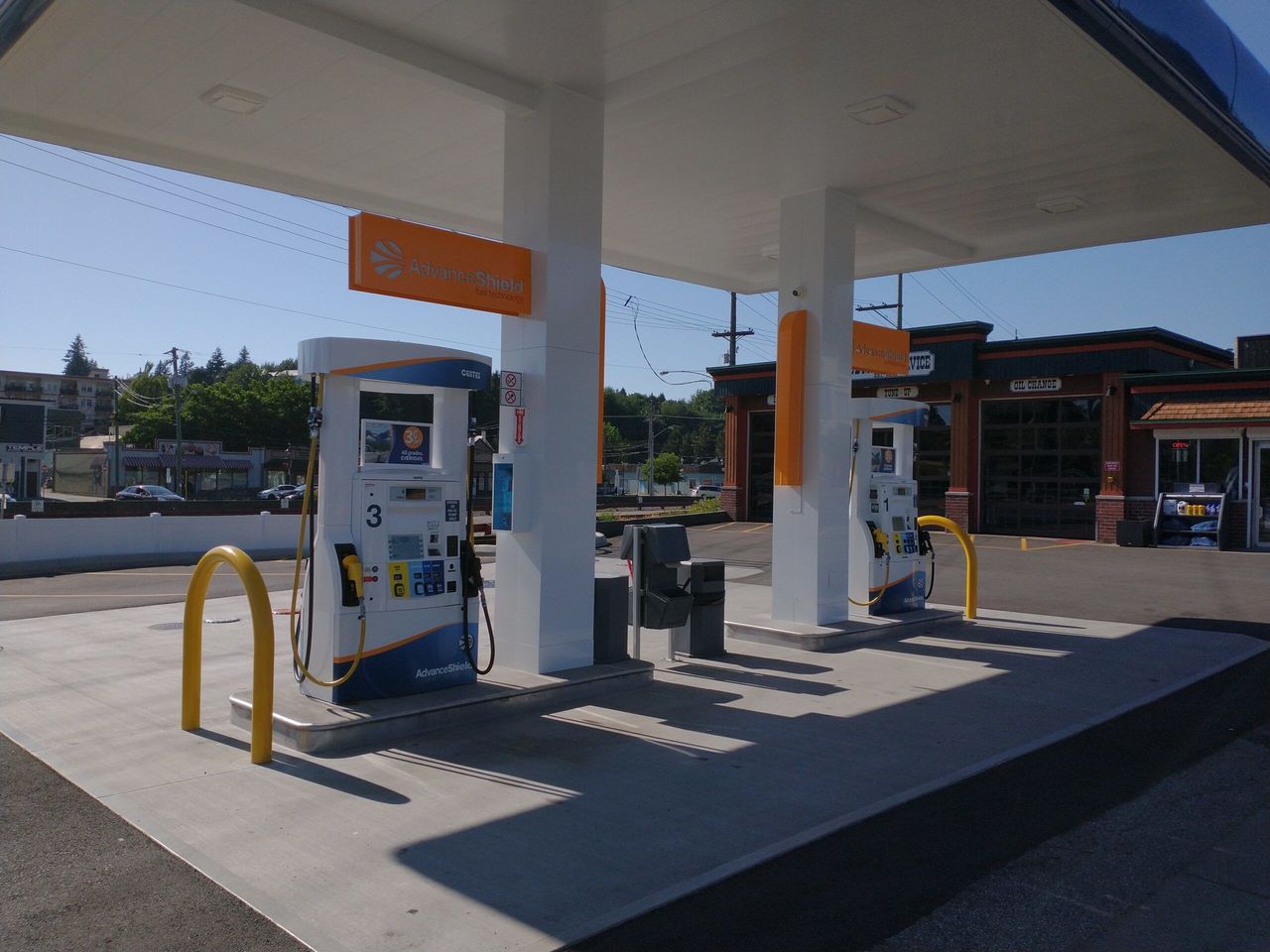Two pumps under the Centex canopy, with the Hub Motor Service bays behind.