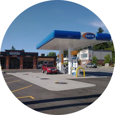 The Centex gas station canopy and pumps, with the Hub Motor Service shop behind