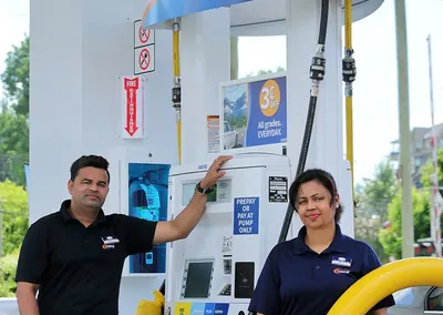 Two Centex staff at the pumps