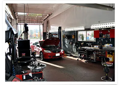 A red car in the service bay
